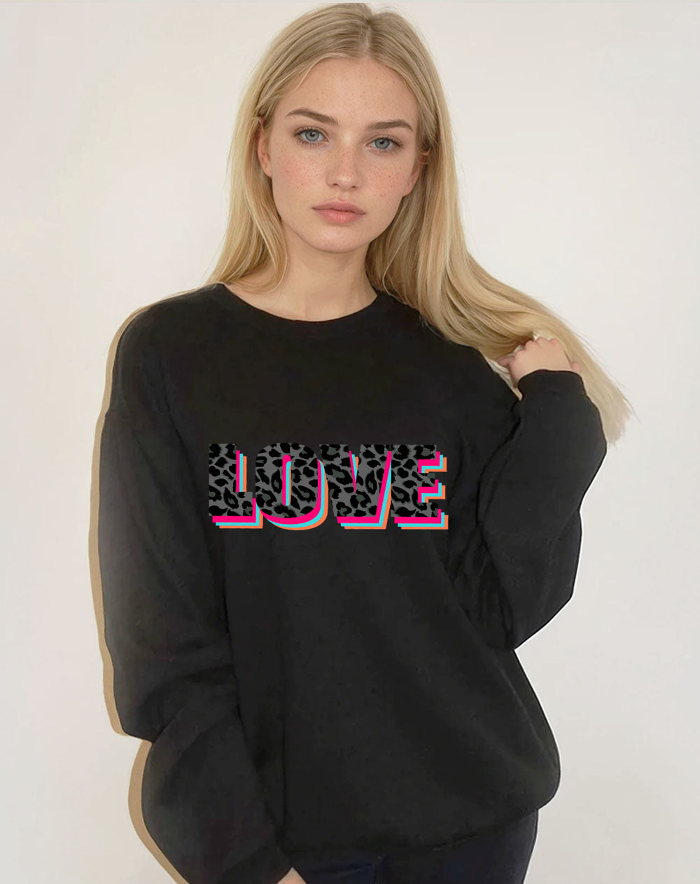 Wildly in Love graphic sweatshirt in black with subtle leopard lettering"