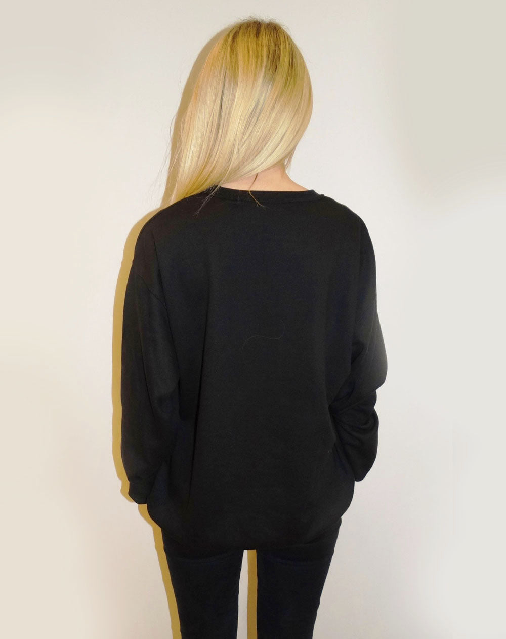 Soft black jumper with tonal leopard Wildly in Love slogan