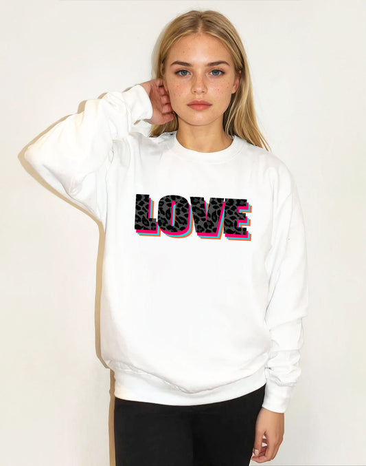 Graphic white crewneck with bold Wildly in Love leopard text design