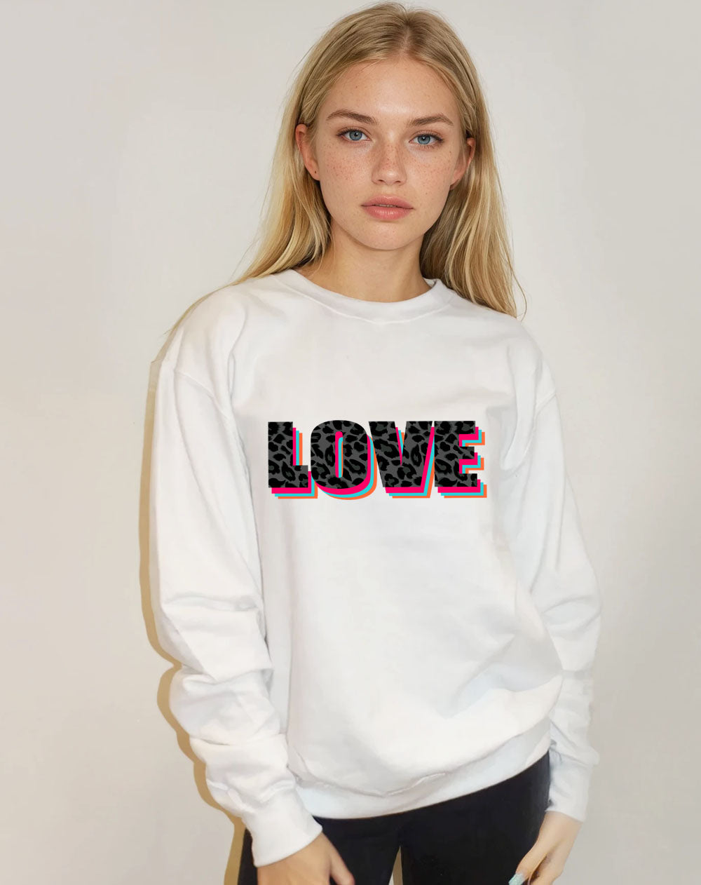White jumper featuring black leopard print Wildly in Love slogan